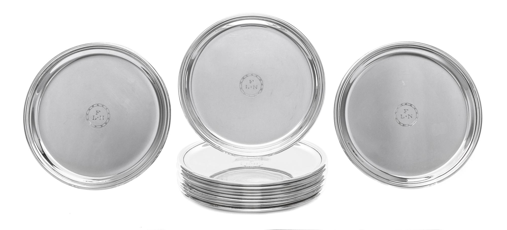 A Set of Twelve American Silver Bread Plates, Ensko, New York, NY, First half 20th century, each of circular form with a stepped border
