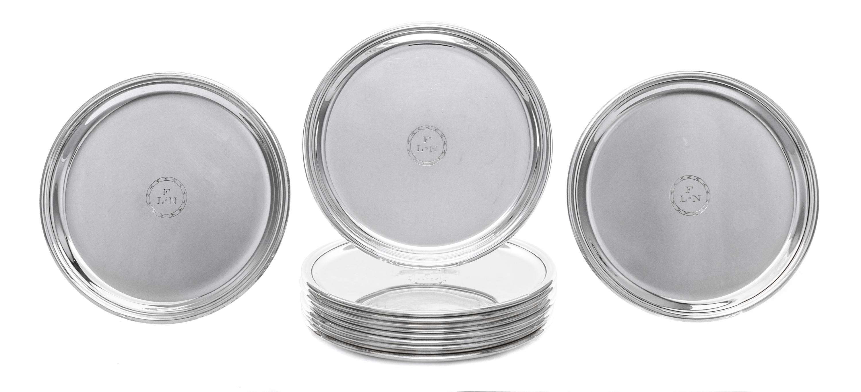 A Set of Twelve American Silver Bread Plates, Ensko, New York, NY, First half 20th century, each of circular form with a stepped border