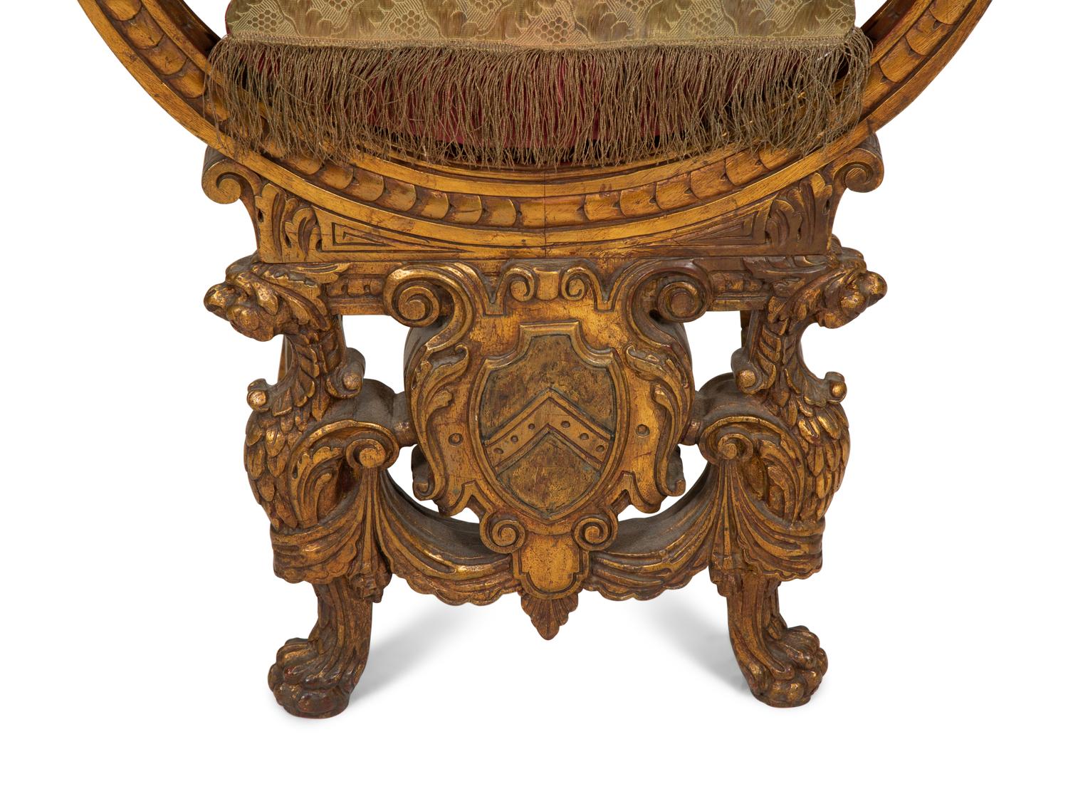 An Italian Giltwood Savonarola Armchair