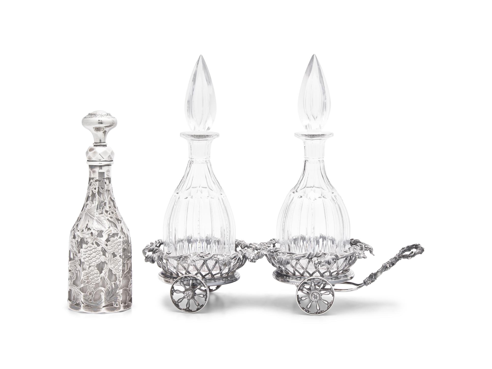 A Victorian Silver-Plated Wine Trolley and Three Glass Decanters
