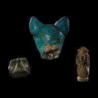Three Egyptian Bronze and Faience Amulets