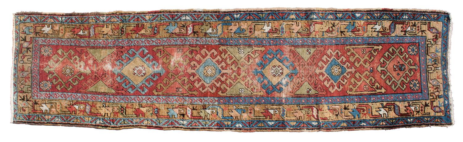 A Qashqai Style Persian Wool Runner 9 feet 7 inches x 2 feet 7 inches.