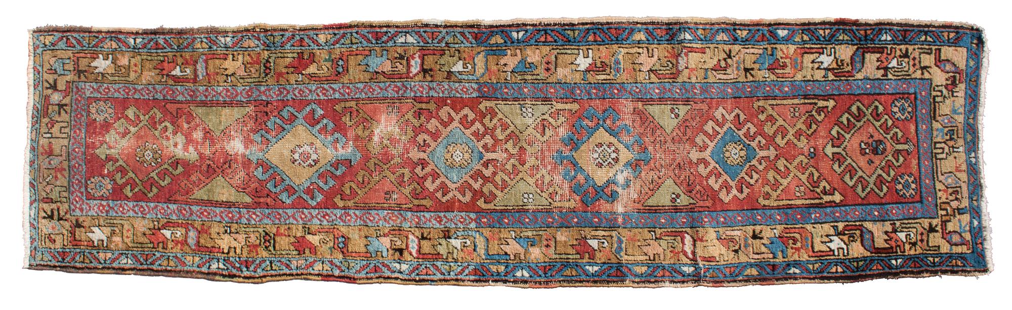 A Qashqai Style Persian Wool Runner 9 feet 7 inches x 2 feet 7 inches.