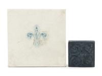 An American Encaustic Tile Works Ceramic Tile and a Blue-Glazed Tile