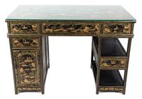 A Chinese Black and Gilt Lacquered Desk Height 33 x width 47 x depth 25 1/2 inches. — 20TH CENTURY