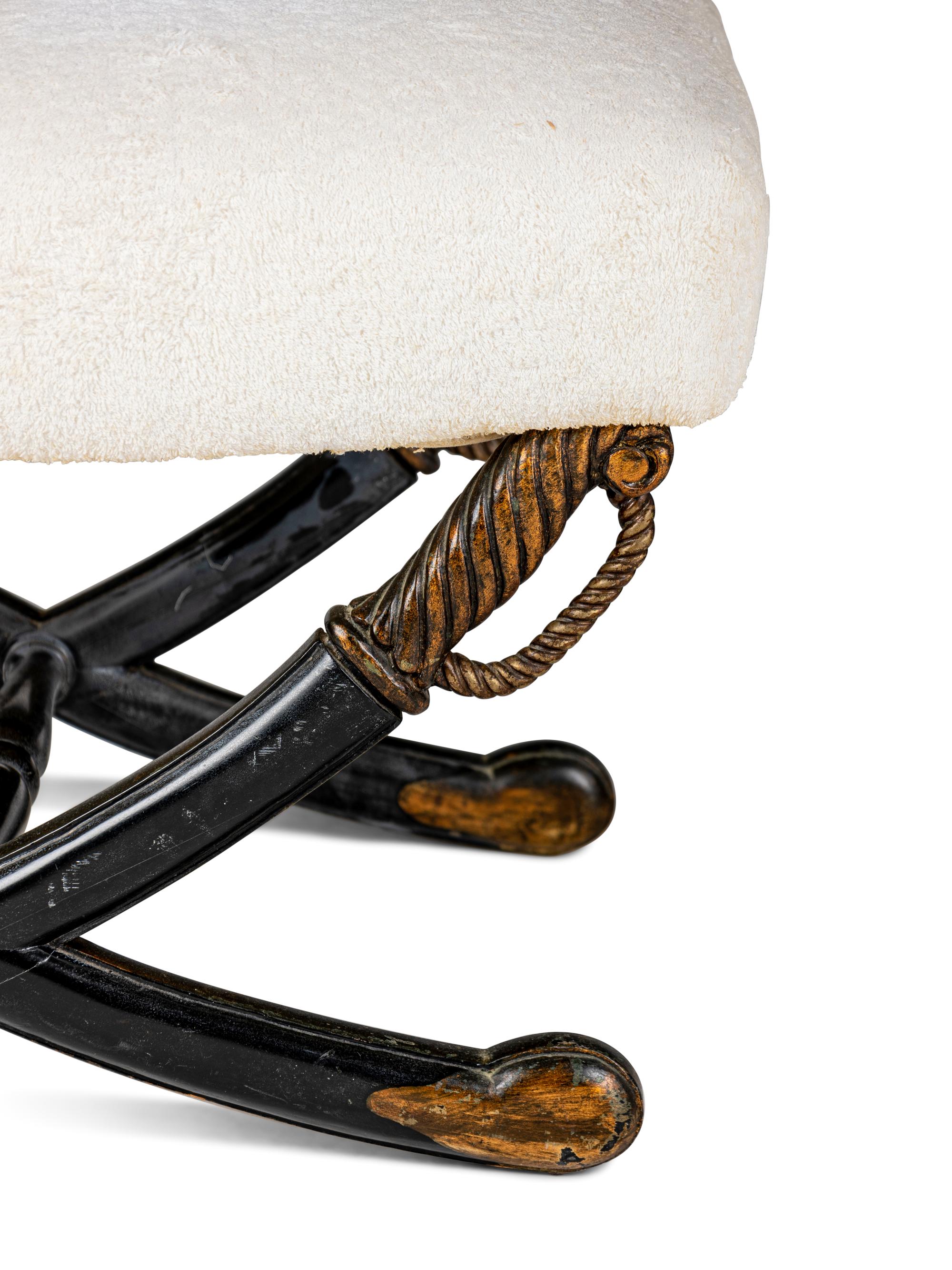 An Italian Style Black-Painted and Parcel-Gilt X-Frame Stool