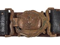 [MILITIA]. A group of pre-Civil War items, including ca 1850s militia belt and belt plate, officer's sash, and epaulettes.