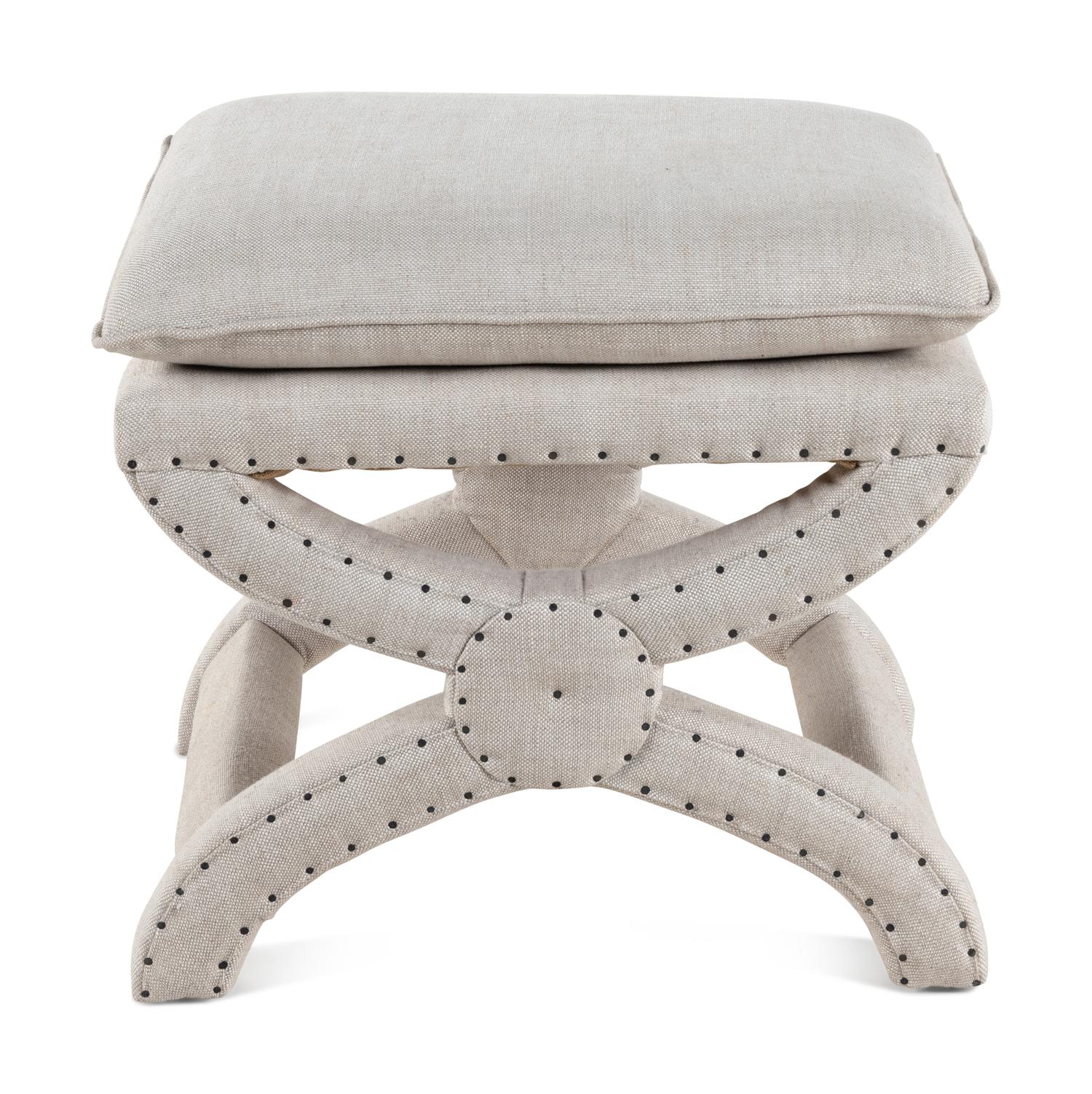 A Contemporary Linen-Upholstered X-Form Stool