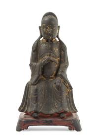 A Chinese Parcel Gilt Bronze Figure of a Scholar MING DYNASTY Height 9 1/2 inches. — MING DYNASTY