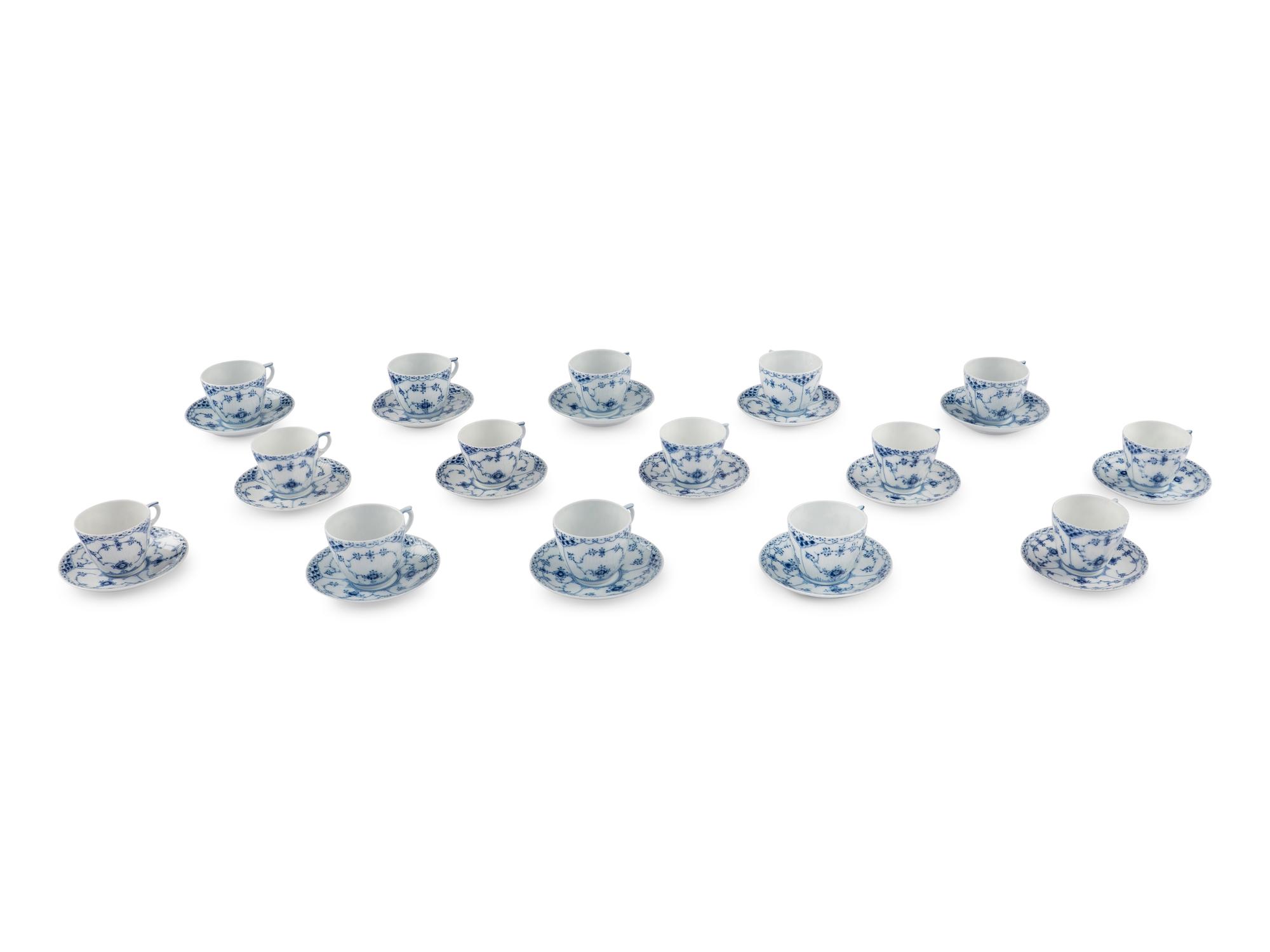 A Group of Royal Copenhagen Blue Fluted Teacups and Saucers