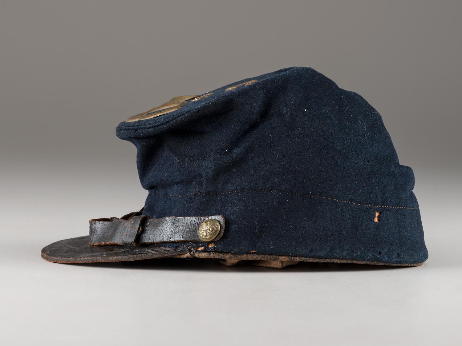 [CIVIL WAR]. Company C, 179th Pennsylvania 1858 forage cap, with identification to J.K. Hunsleker carved into visor.