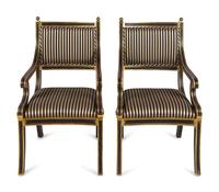 A Set of Eight Regency Style Parcel-Gilt and Black-Painted Armchairs — 20TH CENTURY