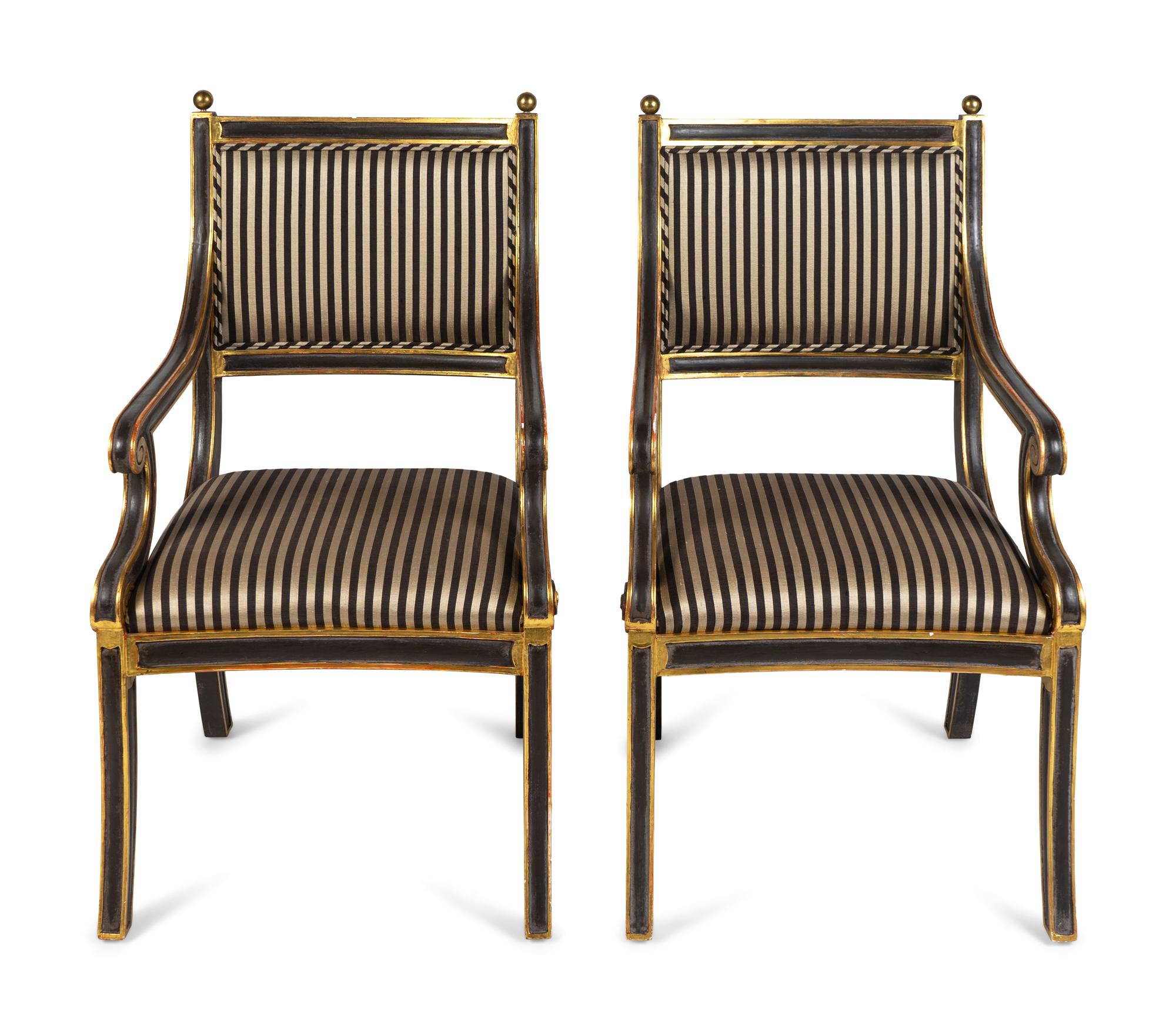 A Set of Eight Regency Style Parcel-Gilt and Black-Painted Armchairs — 20TH CENTURY