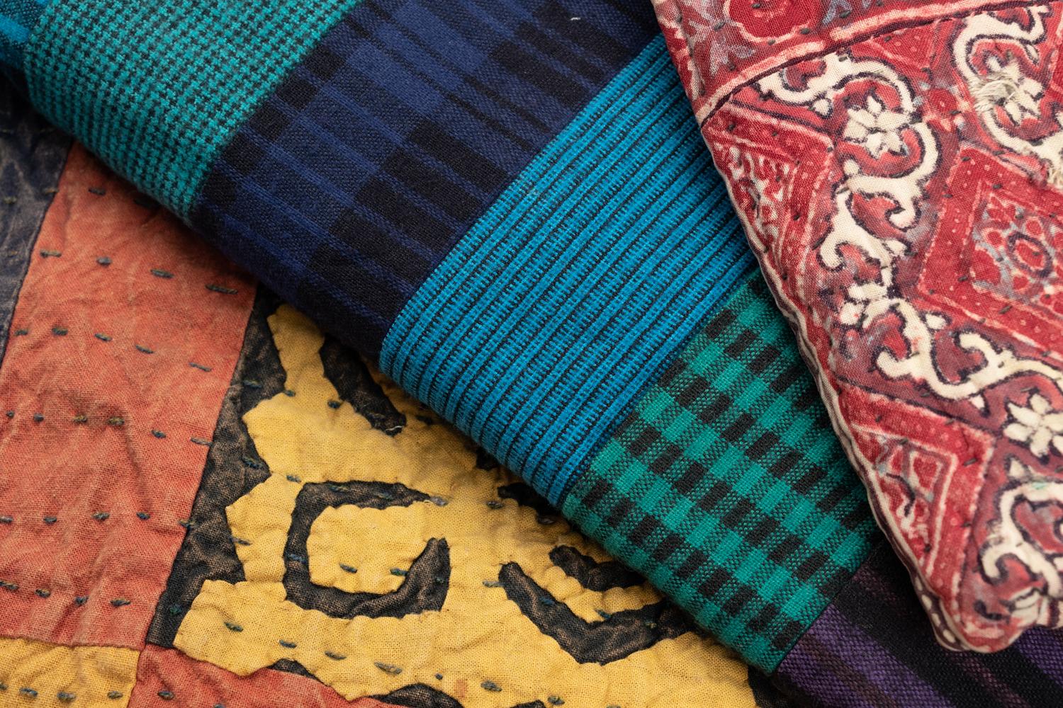 Three Patchwork Quilts