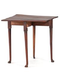 A George III Figured Mahogany Pad-Foot Drop-Leaf Table