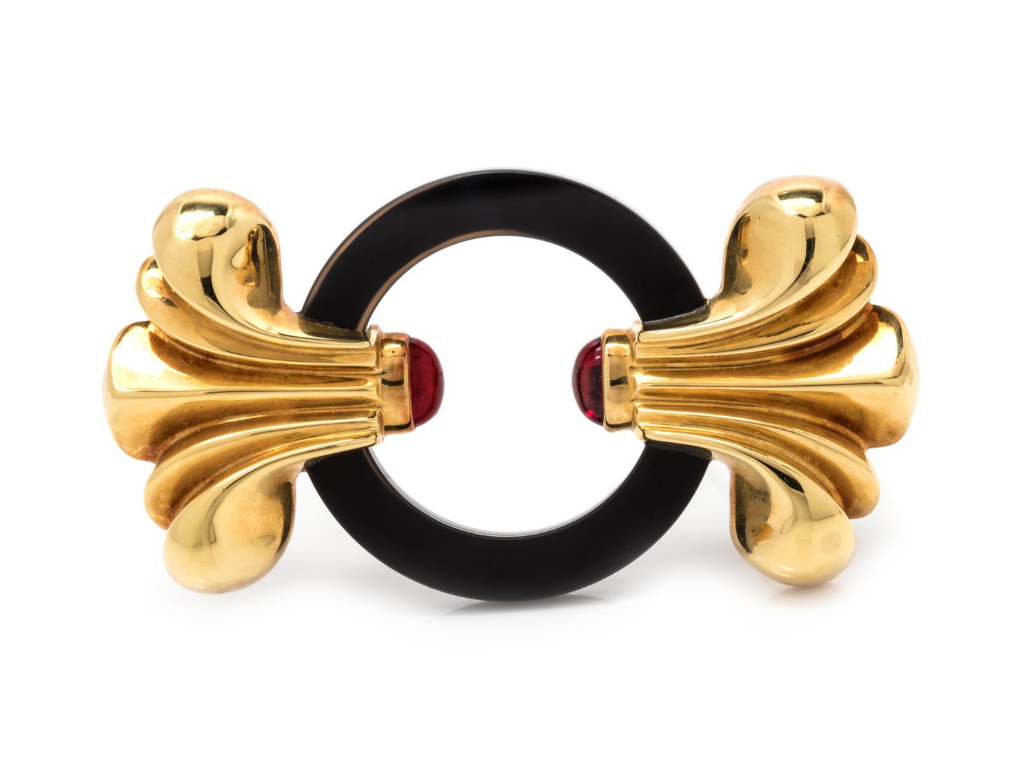 An 18 Karat Yellow Gold, Onyx, and Pink Tourmaline Brooch, Lagos,