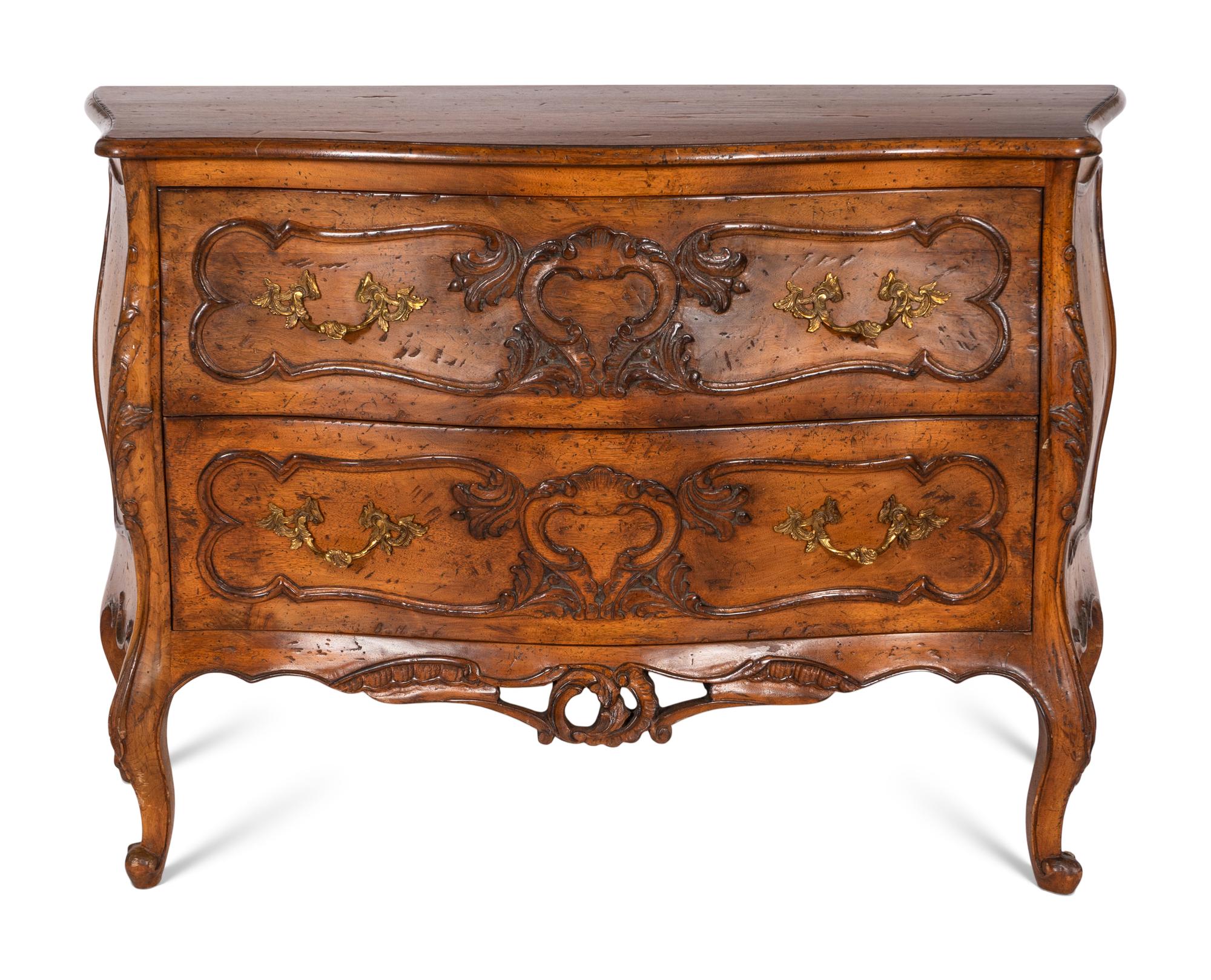 A Pair of Louis XV Style Walnut Bombé Form Commodes