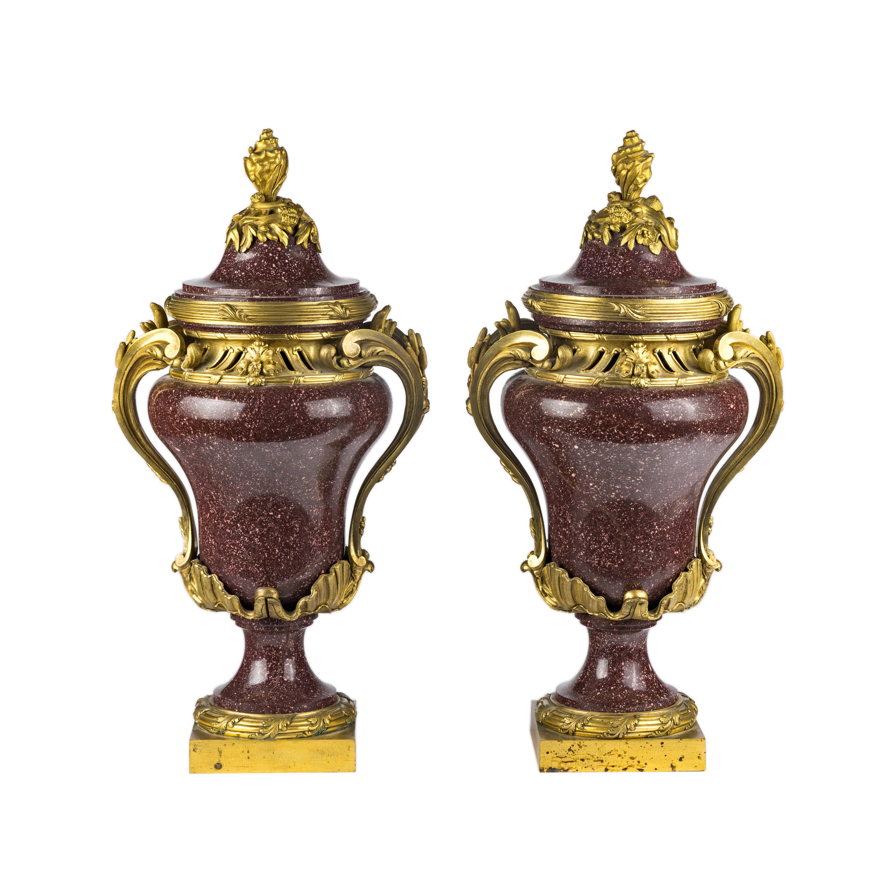 A Pair of Gilt Bronze Mounted Porphyry Urns