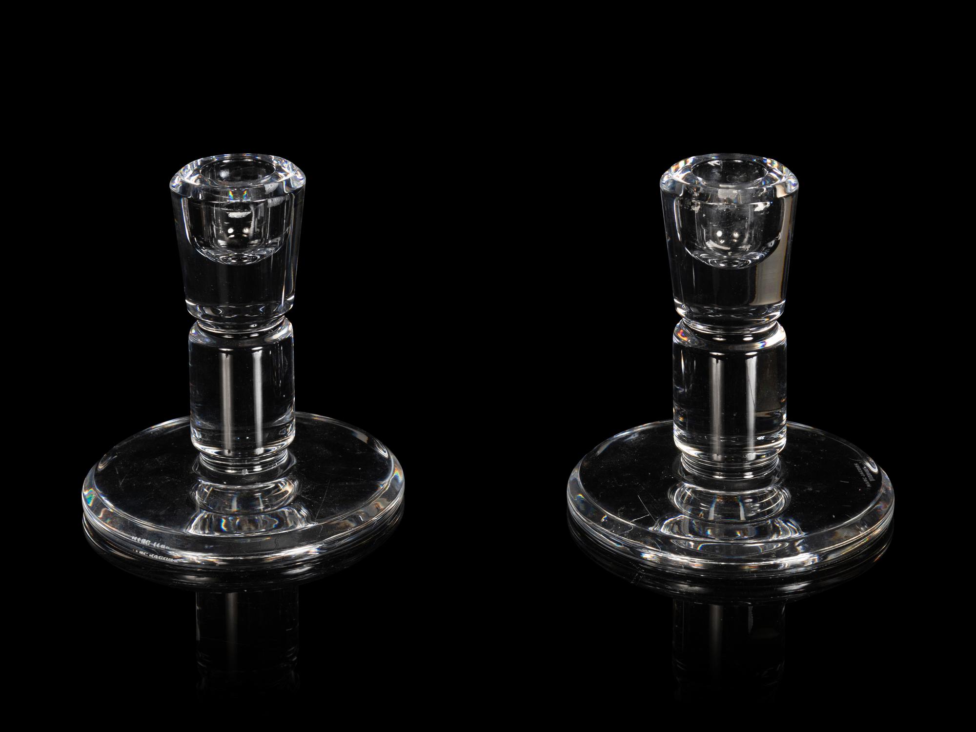 A Pair of Molded Glass Candlesticks