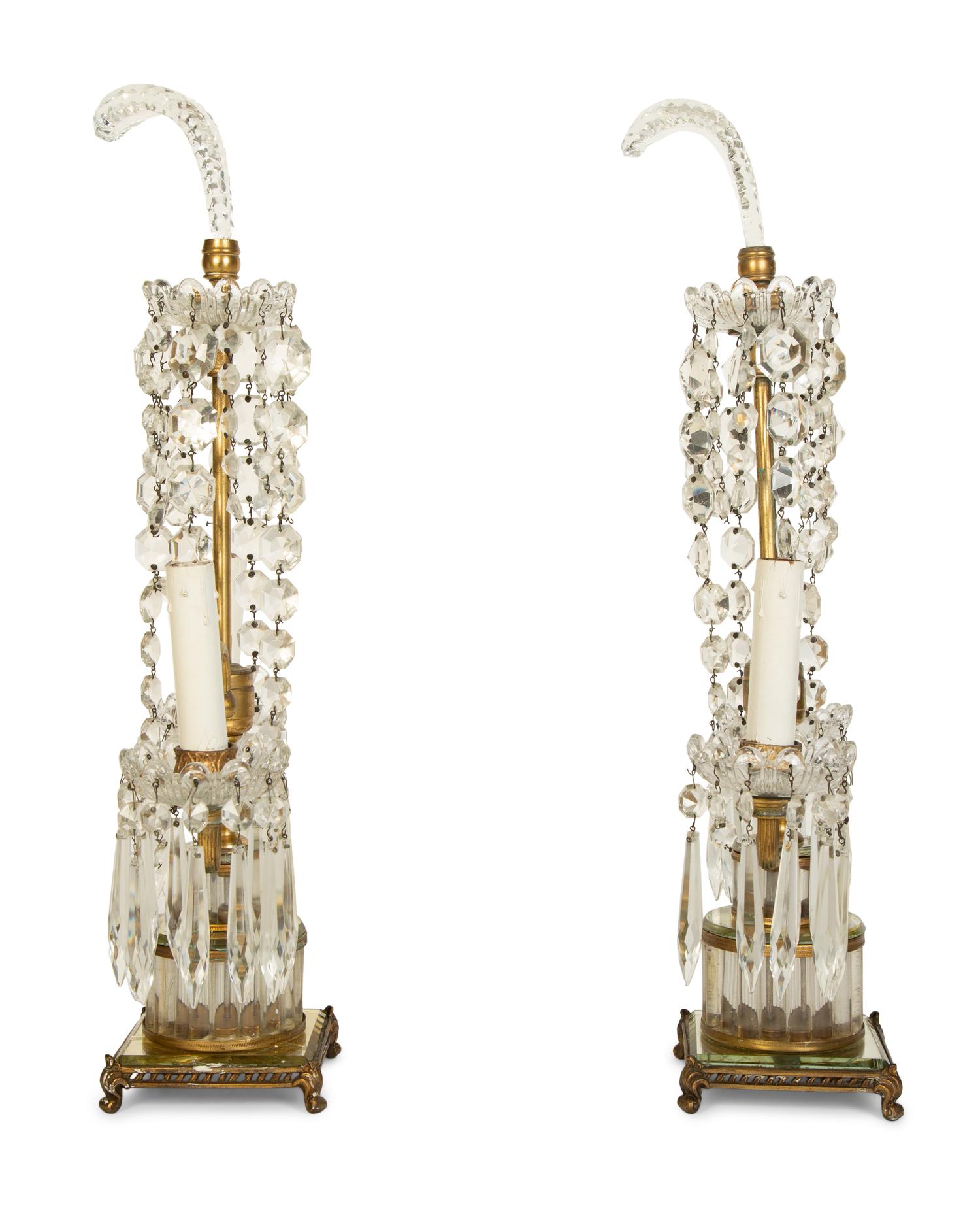 A Pair of Continental Gilt Metal and Glass Two-Light Candelabra