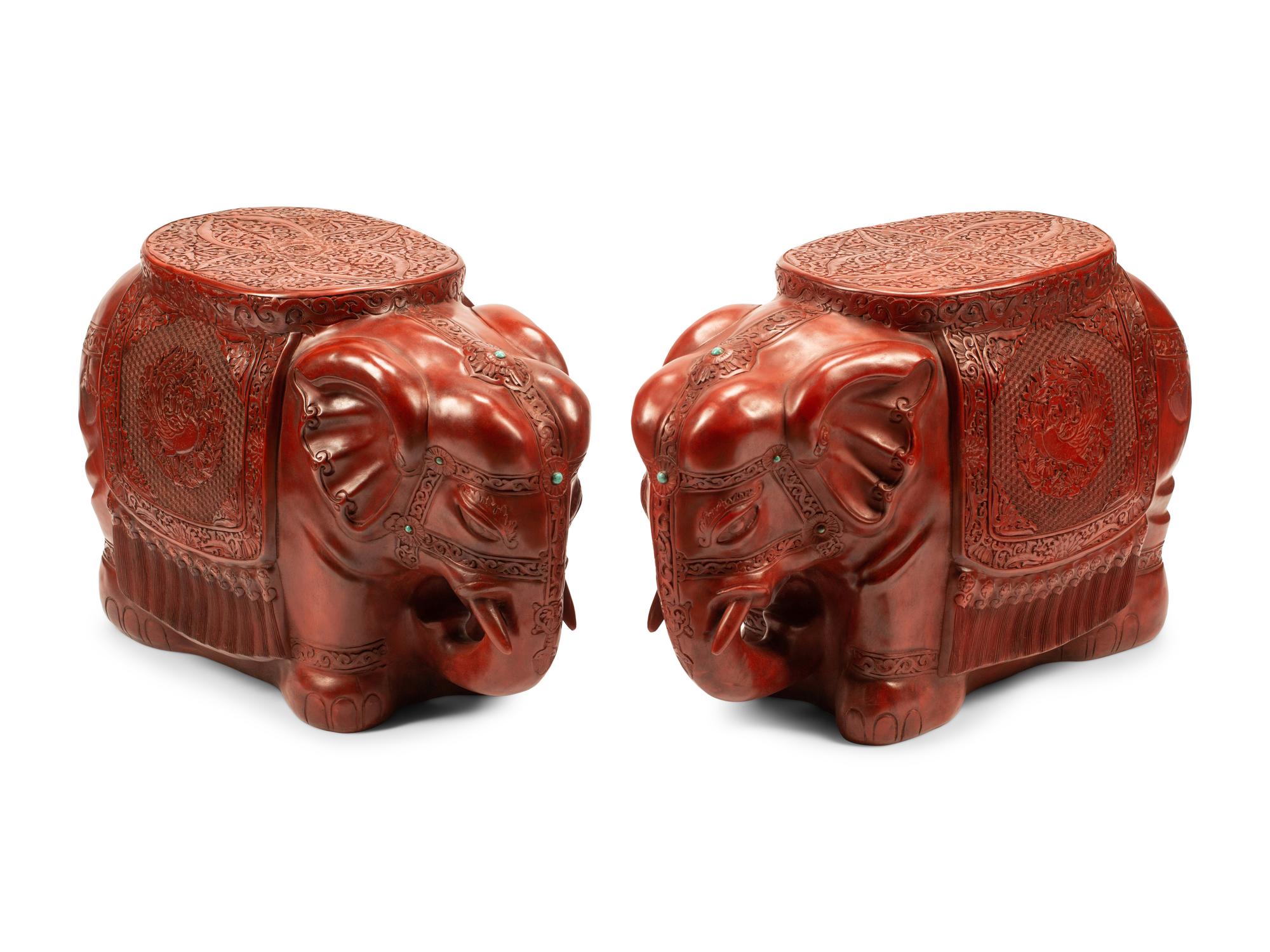 A Pair of Chinese Carved Red Lacquer Elephant Seats
