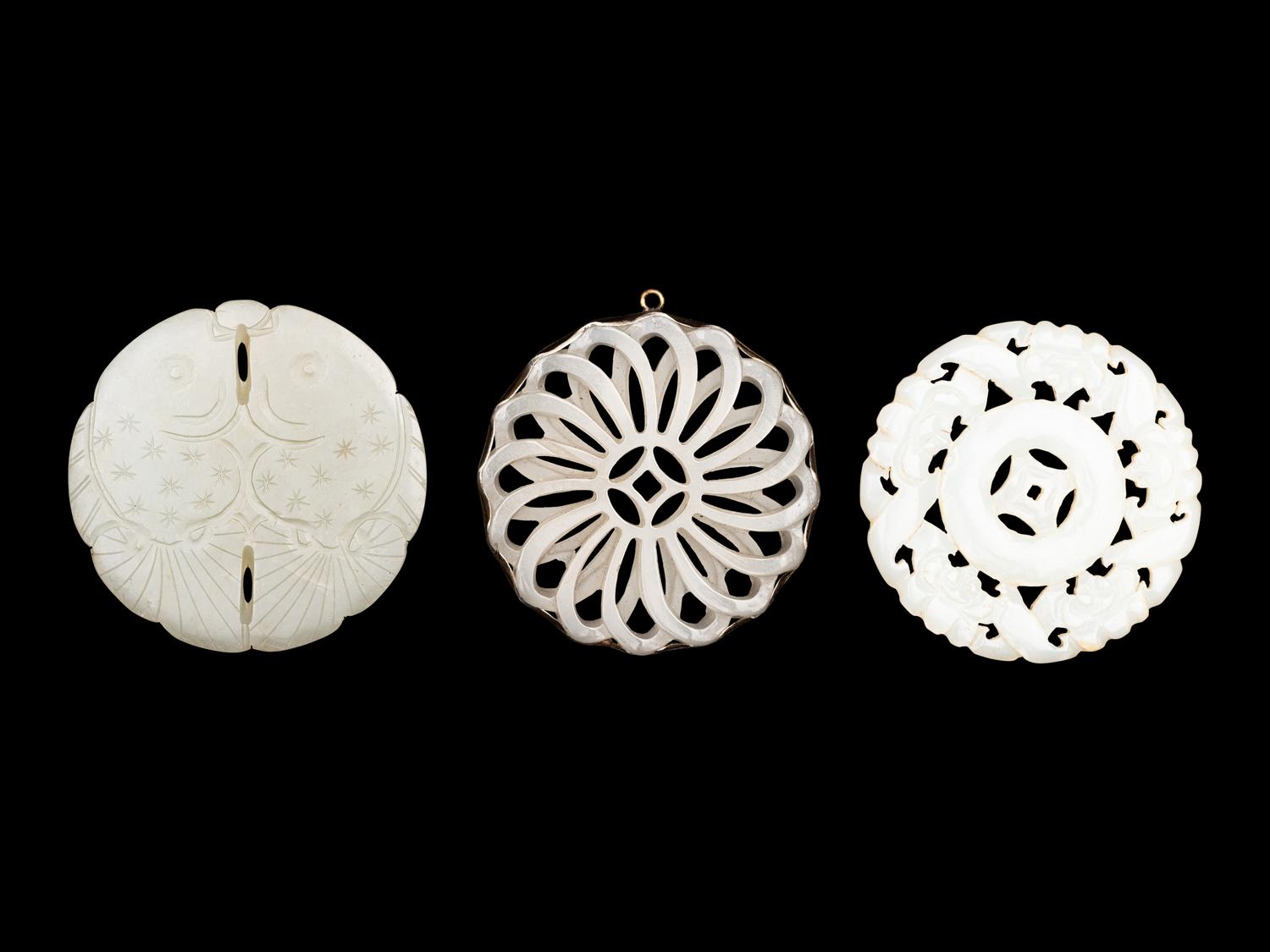 Three Pale Celadon Jade Pendants