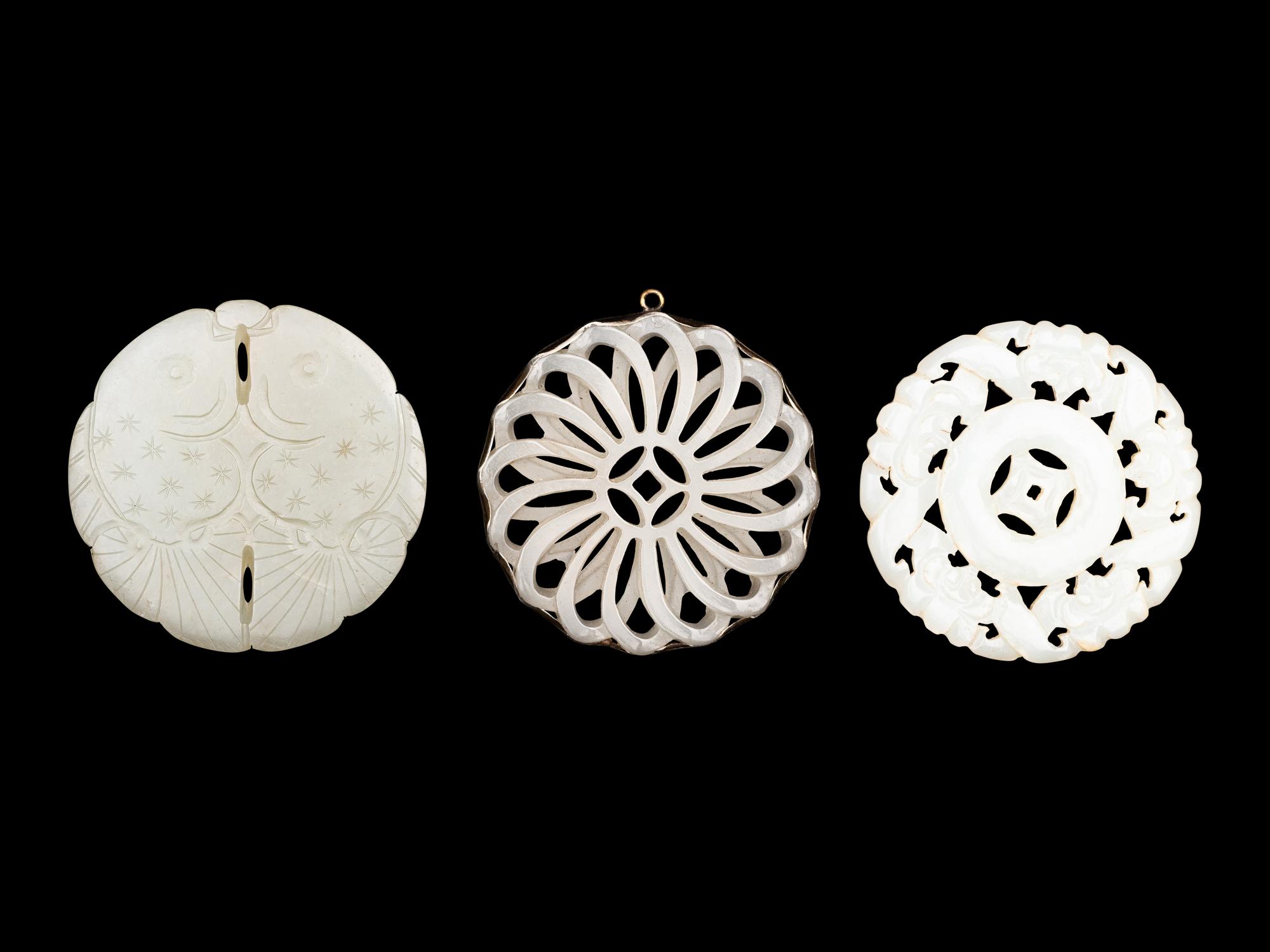 Three Pale Celadon Jade Pendants