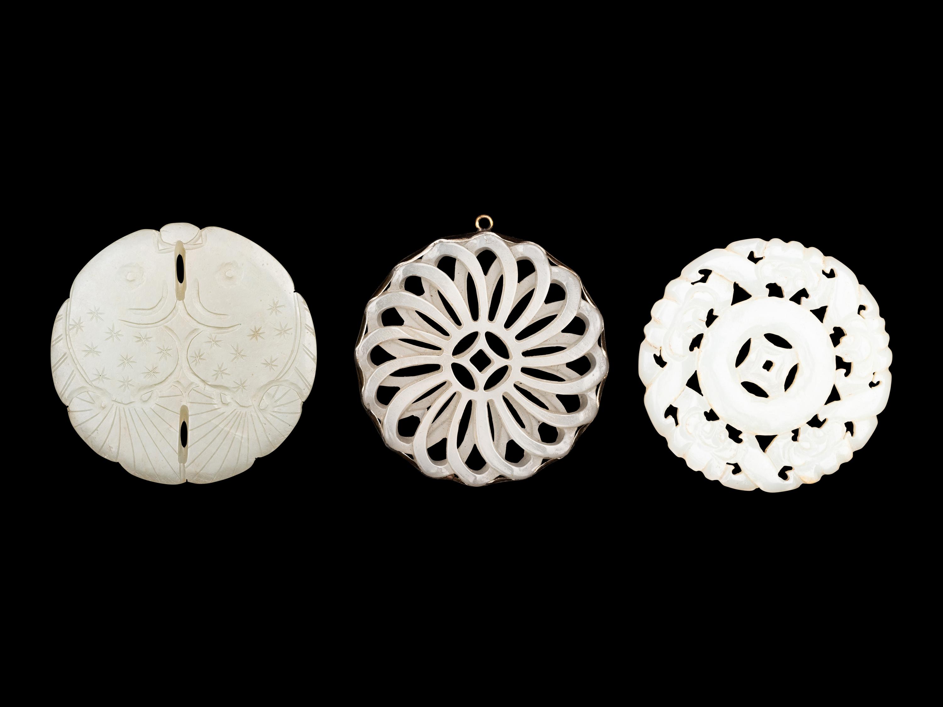 Three Pale Celadon Jade Pendants