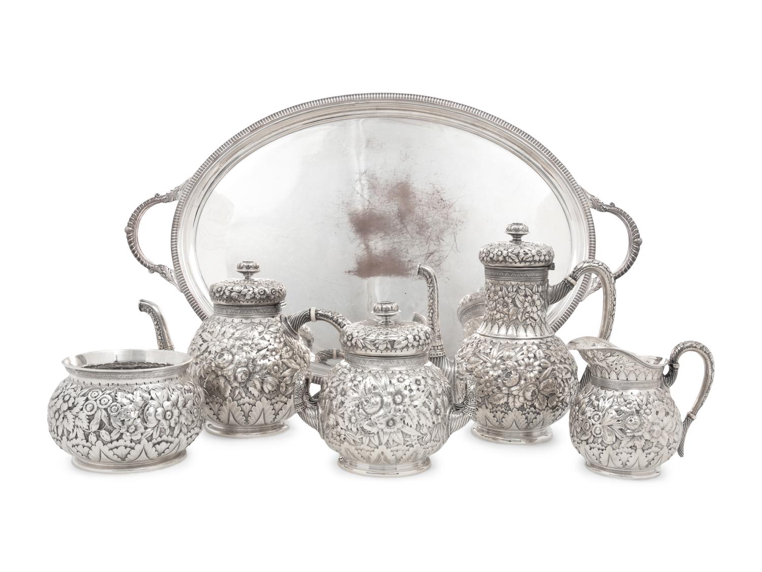 A Tiffany and Co. Silver Repoussé Five-Piece Tea and Coffee Service
