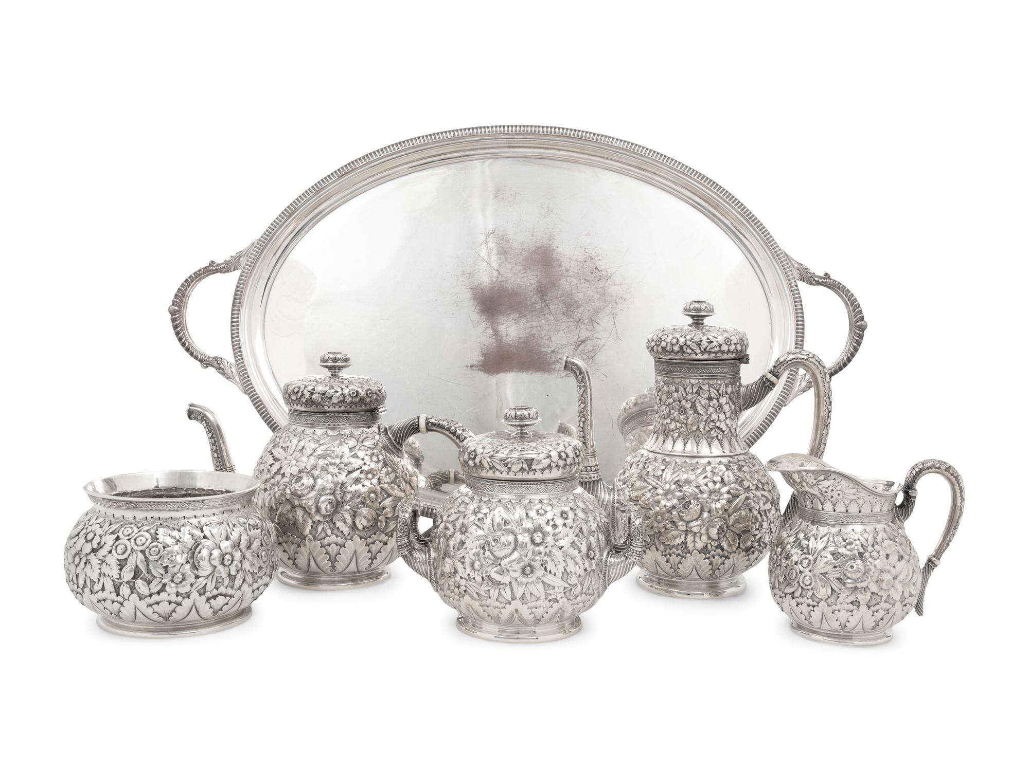 A Tiffany and Co. Silver Repoussé Five-Piece Tea and Coffee Service