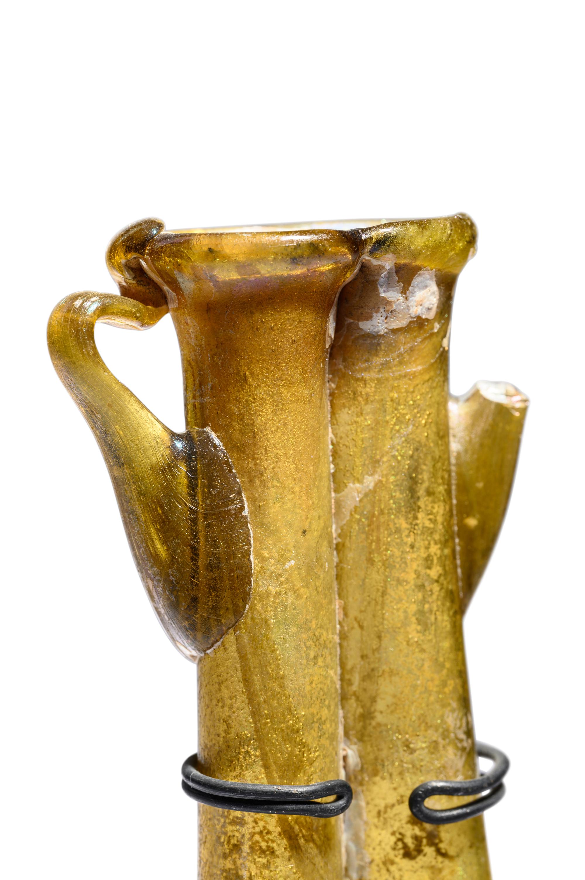 A Roman Yellow-Green Glass Double Unguentarium
