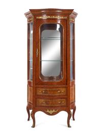 A Louis XV/XVI Transitional Style Gilt Metal Mounted Kingwood Bombe Vitrine Cabinet