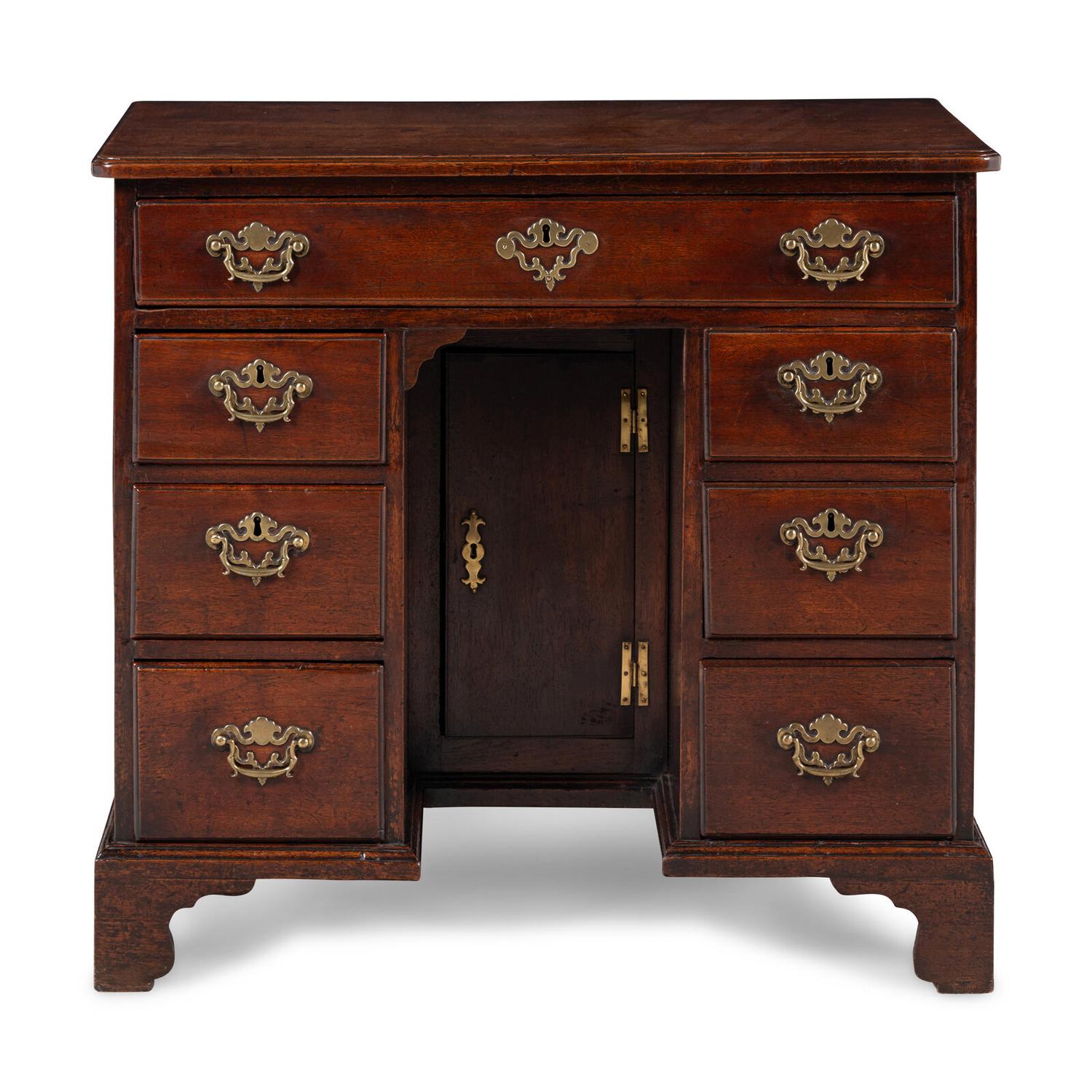A George II Walnut Kneehole Desk