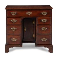 A George II Walnut Kneehole Desk