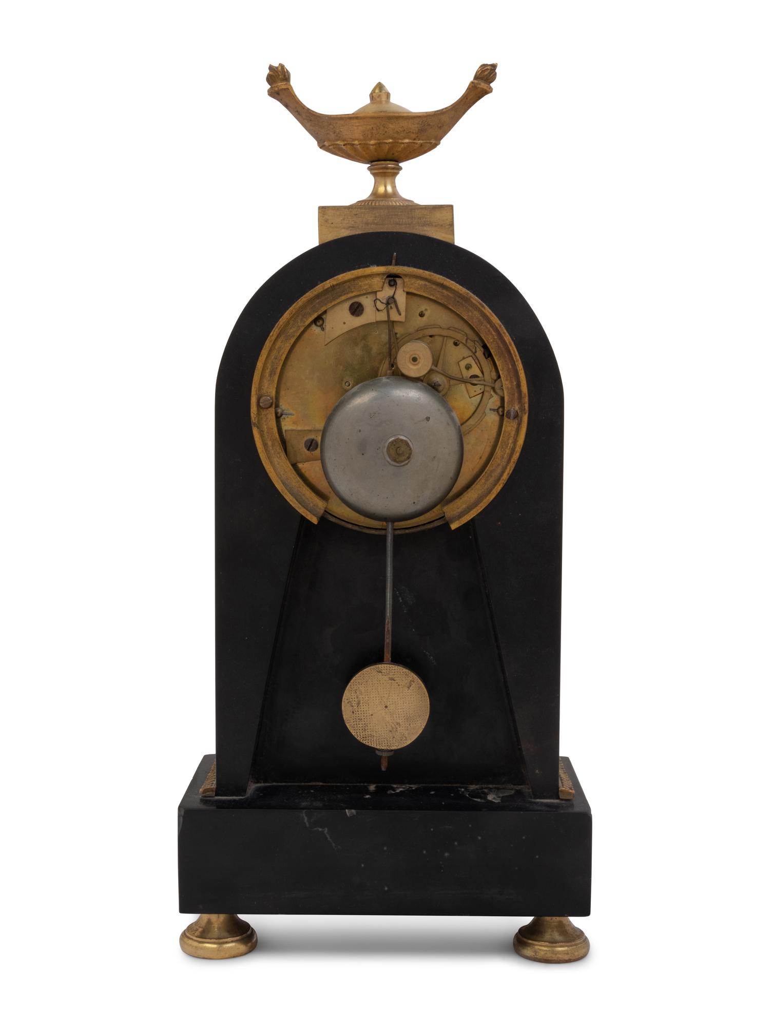 A Directoire Gilt and Patinated Bronze Mantel Clock