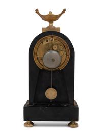 A Directoire Gilt and Patinated Bronze Mantel Clock