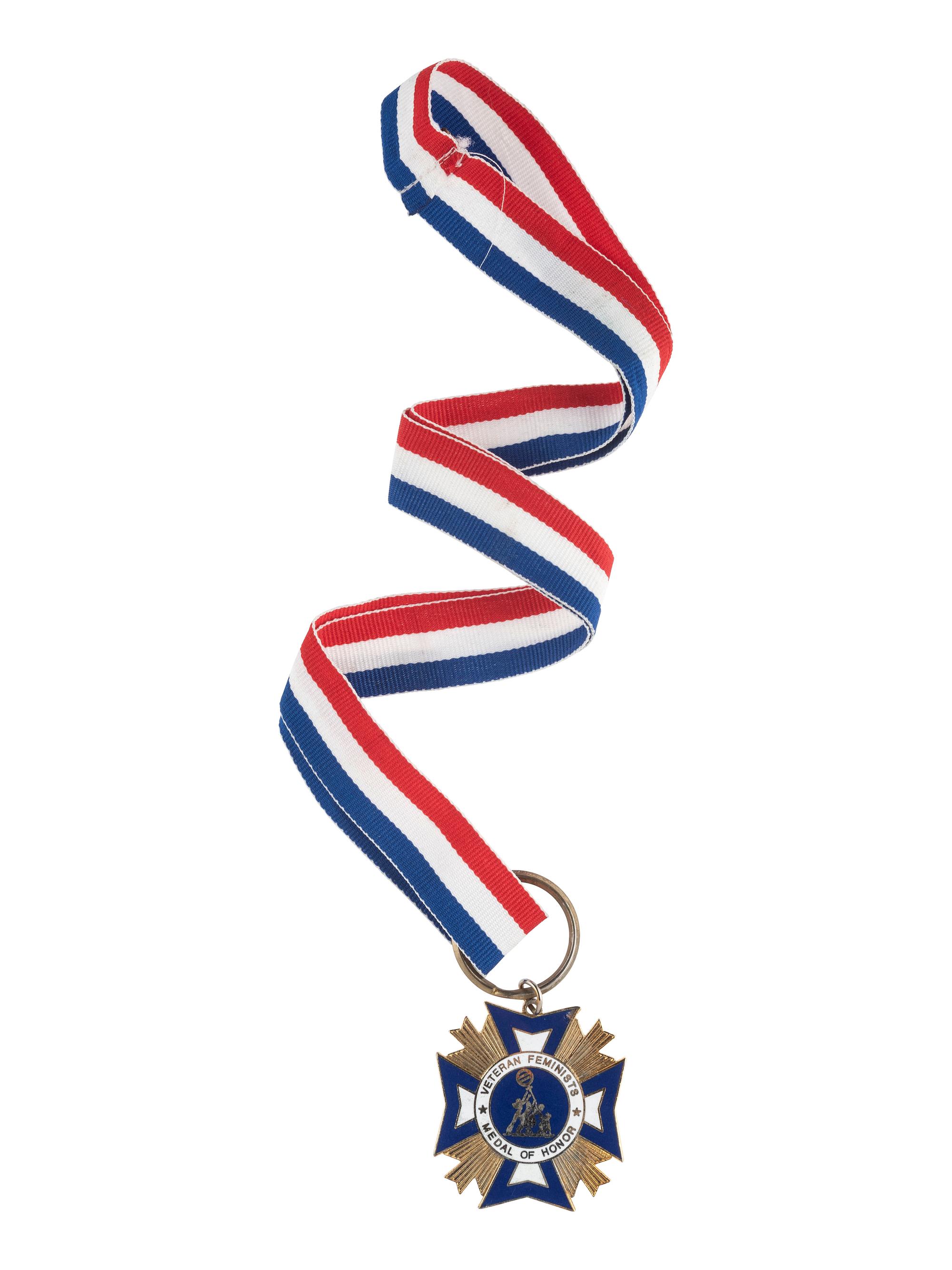 [WOMEN'S SUFFRAGE]. A collection of items belonging to women's rights activist Mariwyn Heath, incl. "Votes for Women" pennant, Veteran Feminists Medal of Honor, pinbacks, buttons, & pewter figures.