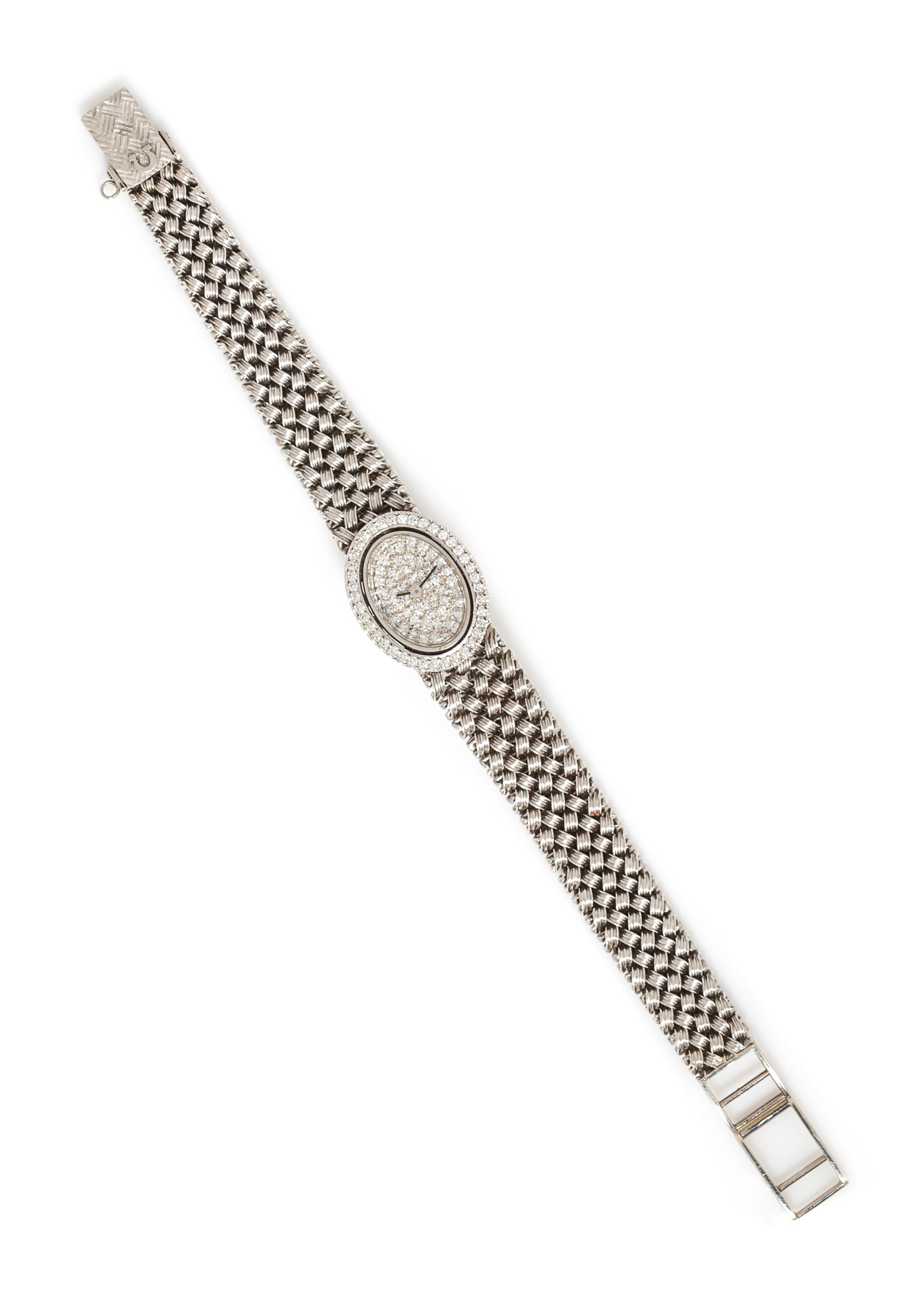 A 14 Karat White Gold and Diamond Wristwatch, Omega, 27.30 dwts.