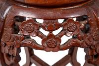 A Chinese Export Carved Wood and Marble-Top Jardinière Stand