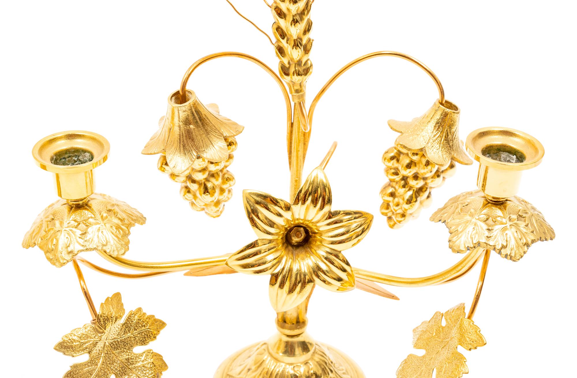 A Group of Gilt Medal Floral Table Decorations