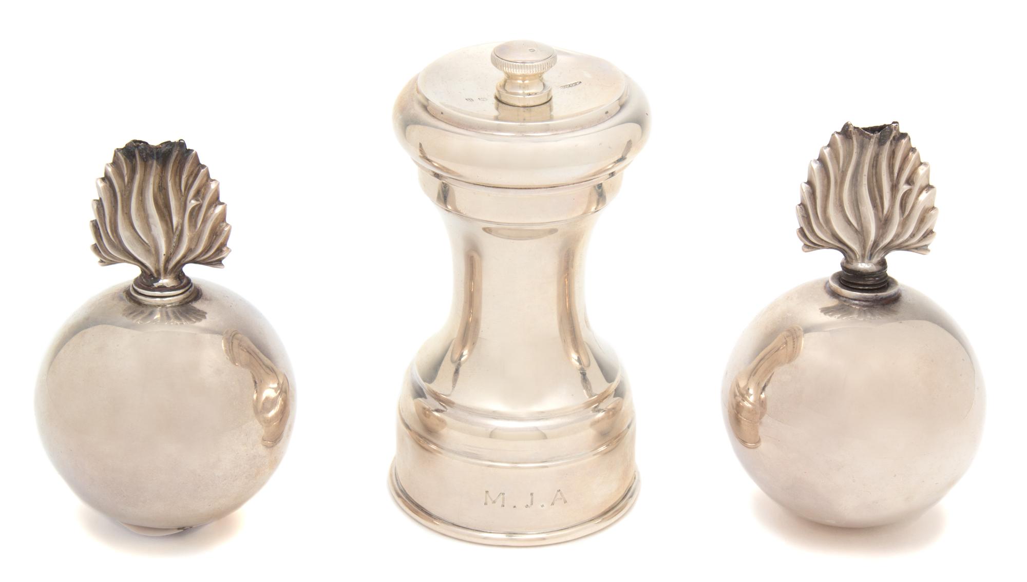 Three George III Silver Articles, , comprising: a peppermill, JG&S, Birmingham, 1912 a pair of wick holders, Birmingham, 1930, of globu