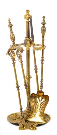 A Set of French Gilt Bronze Fireplace Tools Height of stand 29 5/8 inches. — LATE 19TH CENTURY