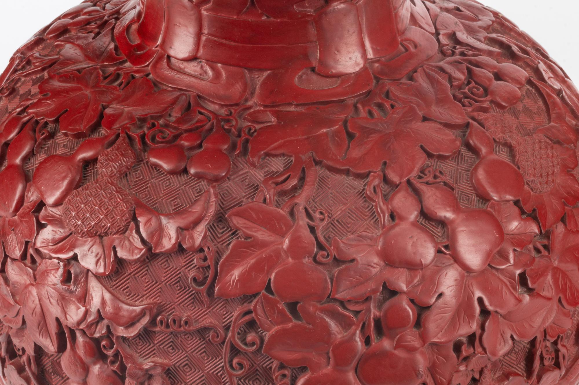 A Pair of Chinese Carved Red Lacquer Double-Gourd Vases