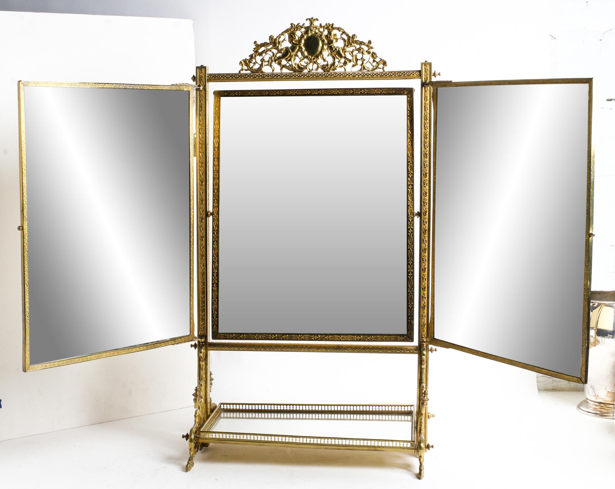 A Neoclassical Style Brass Three-Panel Dressing Mirror Height 29 inches. — EARLY 20TH CENTURY