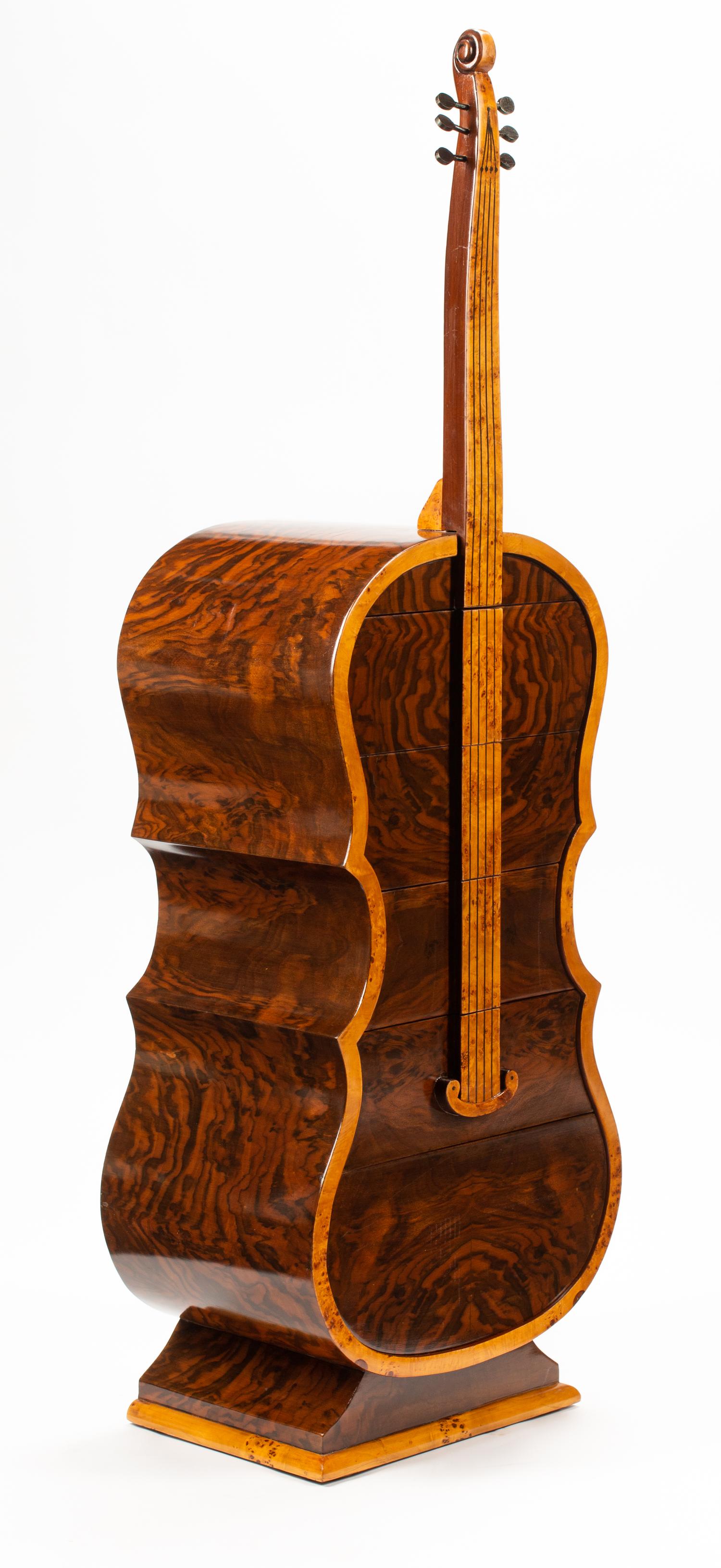 A Burlwood Veneered Cello-Form Cabinet