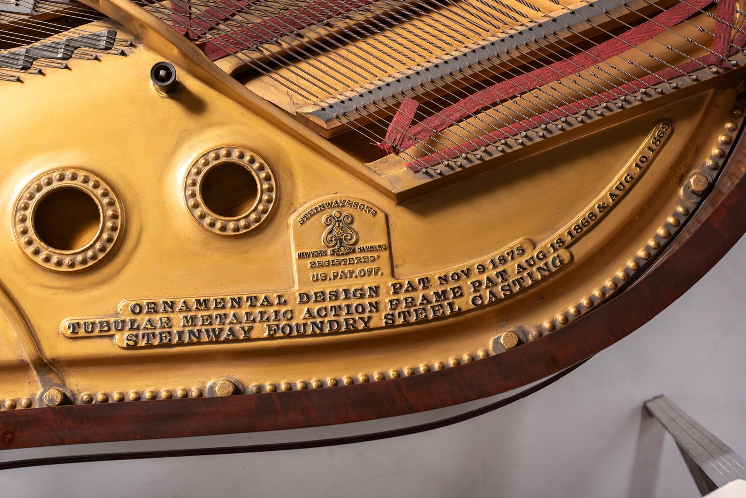 A Steinway and Sons Mahogany Baby Grand Piano