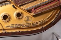 A Steinway and Sons Mahogany Baby Grand Piano