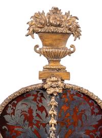 A Swedish Baroque Verre Églomisé and Giltwood Mirror