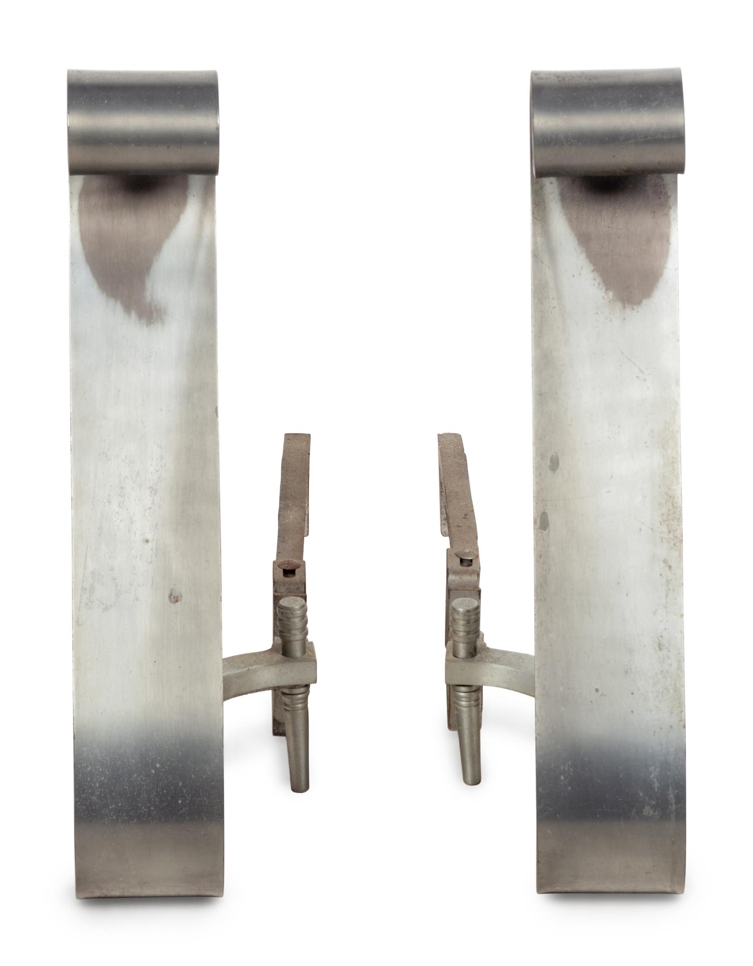 A Pair of Modernist Steel Scroll Andirons