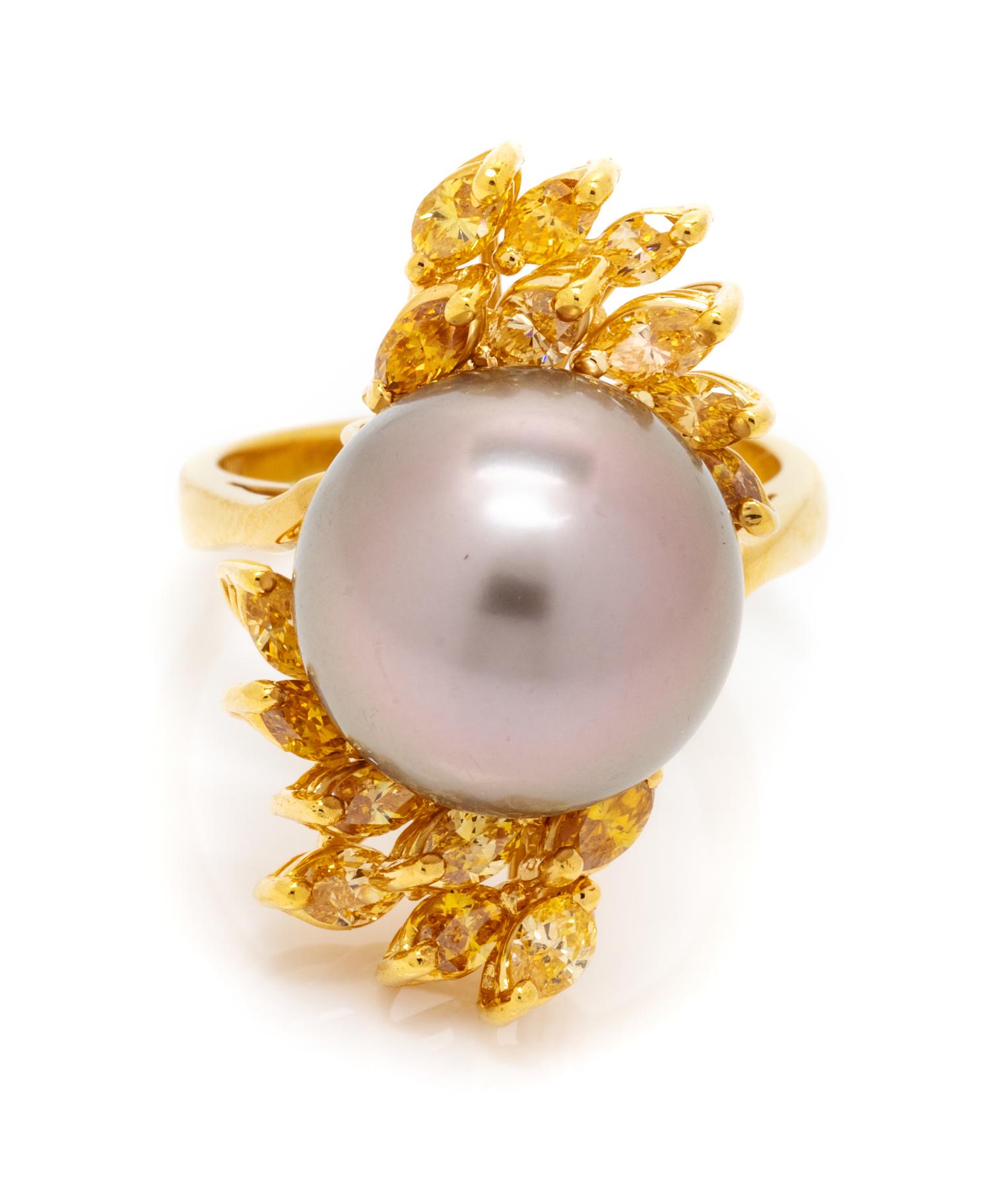 An 18 Karat Yellow Gold, Cultured South Sea Pearl and Colored Diamond Ring, 6.60 dwts.